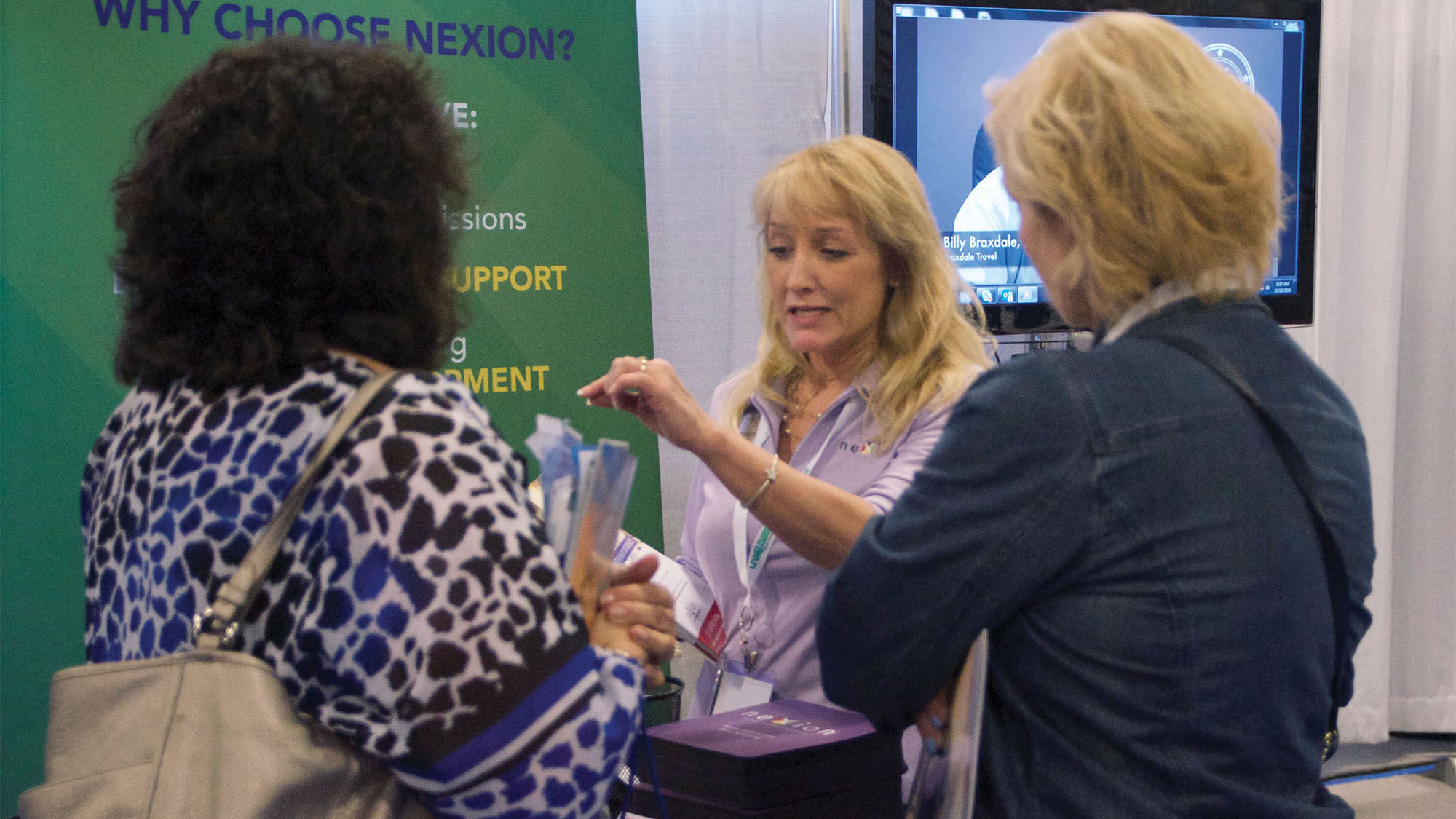 Wendy Graziano, a Nexion representative, spoke with agents at the Exhibitor Showcase about the host agency.