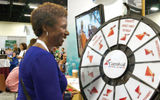 Arlene Hagley, an agent with InteleTravel, tried her luck at Carnival's prize wheel.