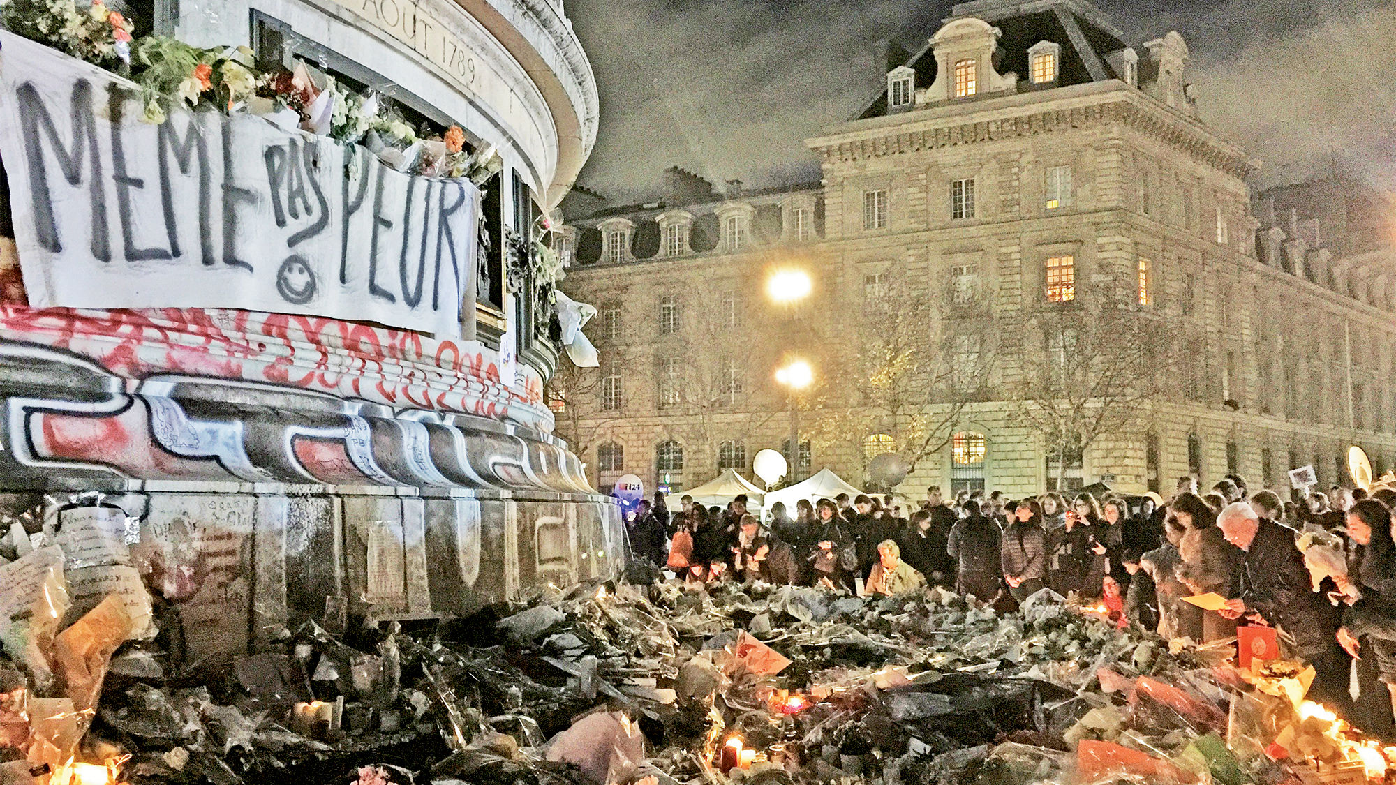 Crowds gathered at the Place de la Republique in Paris in November 2015 to pay their respects to the victims just days after the Nov. 13 terror attacks in that city.