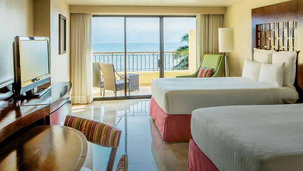 A double oceanfront guestroom at the CasaMagna Marriott Puerto Vallarta Resort & Spa. A double oceanfront guestroom at the CasaMagna Marriott Puerto Vallarta Resort & Spa.
