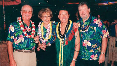 Norwegian Cruise Line president and CEO Andy Stuart, second from right, with passengers on a mid-1990s sailing in Hawaii.