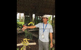The toucan displayed by Harvest Caye's chief naturalist Tony Garel is the national bird of Belize.