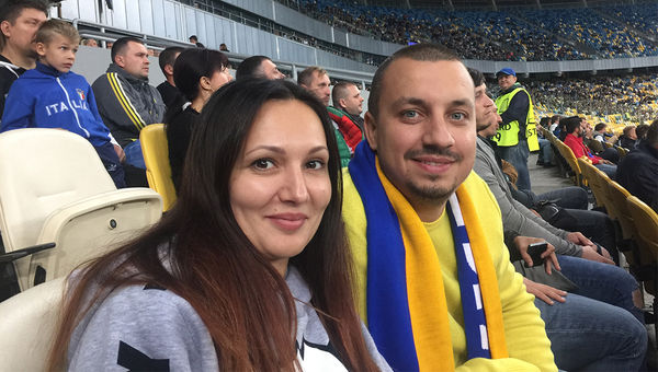 Julia Kulik and Aleksandr Skrypka, owners of receptive operator JC Travel, at a Kiev FC Dynamo soccer game.