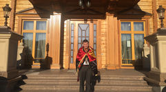 Petro Oliynyk, a Lviv grocer who took up residence as the guardian of Mezhyhirya, the lavish former home of deposed pro-Russia Ukrainian president Vladimir Yanukovych. Oliynyk wears the national flag of resistance as a cape.