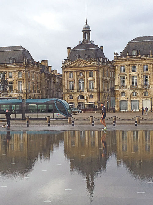 Central Bordeaux is an old town with a modern tram, which reflects the 18th century Palais de la Bourse.
