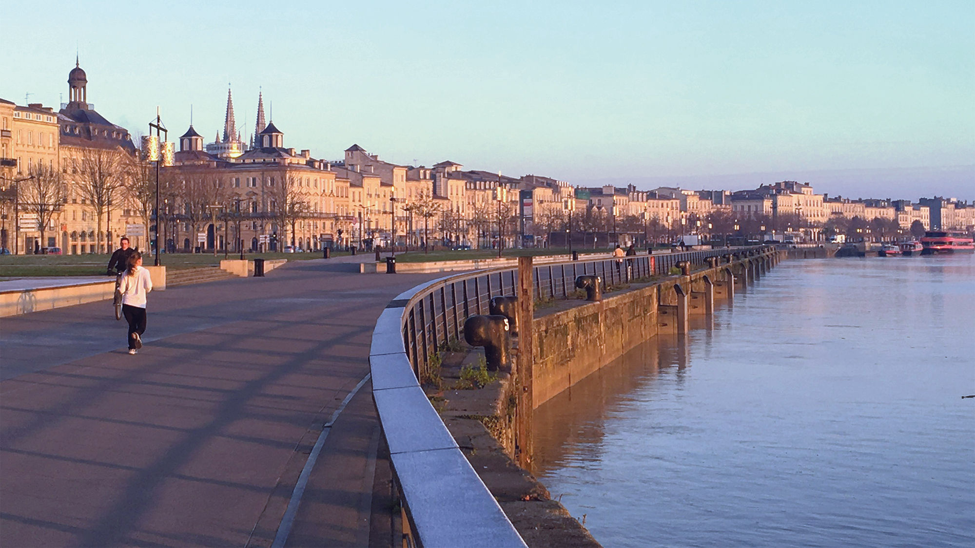 The restored waterfront promenade in Bordeaux, which at its widest point stretches the width of a four-lane highway.