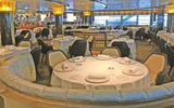 The curving design theme on the Encore can be seen in the banquette in the Grill by Thomas Keller specialty restaurant.