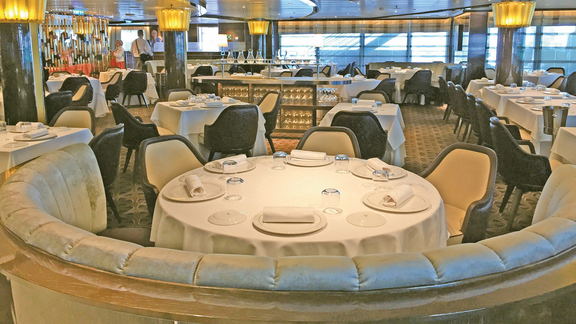 The curving design theme on the Seabourn Encore can be seen in the Grill by Thomas Keller specialty restaurant.