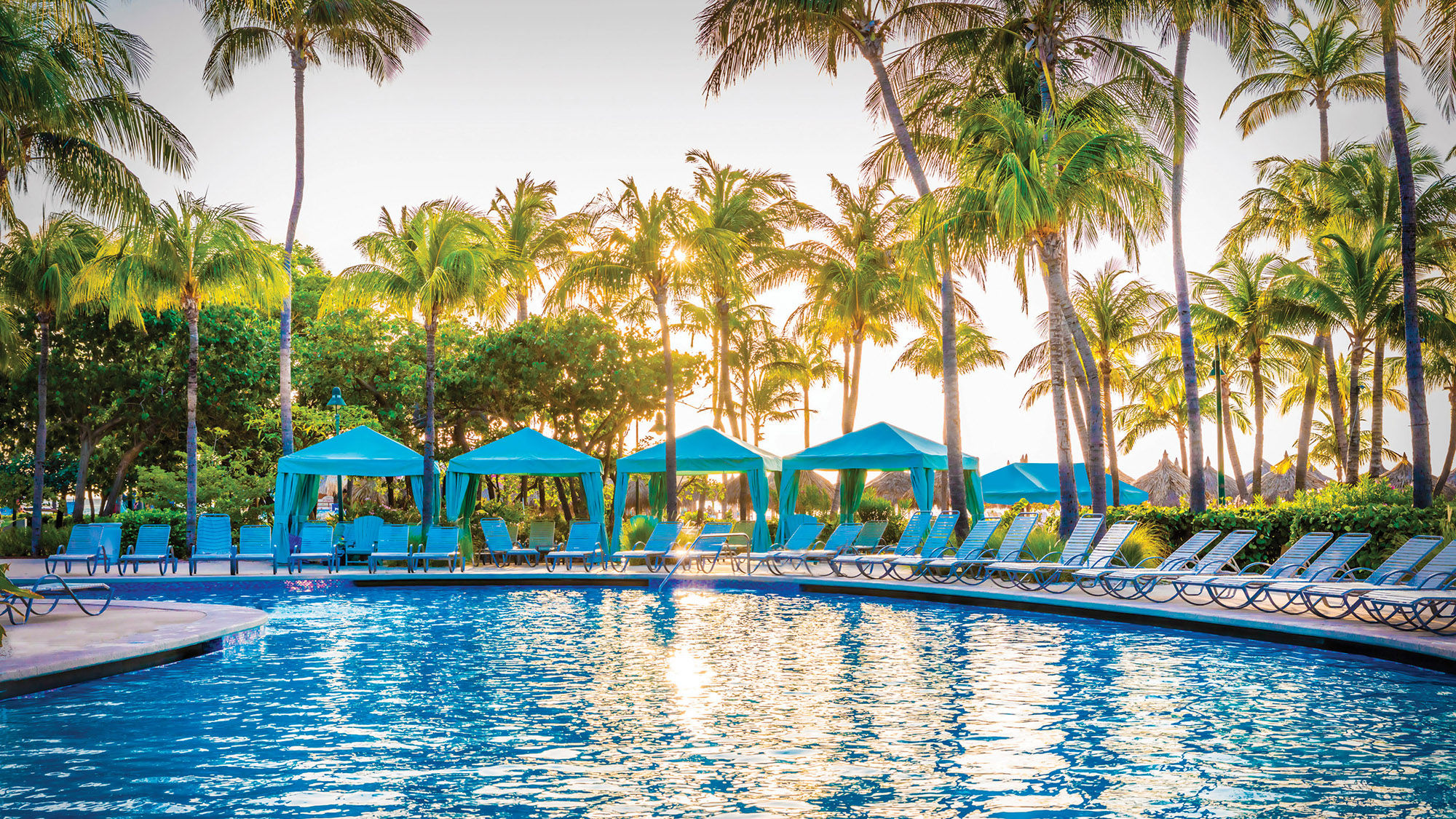 Two pools, a waterfall and a freshwater lagoon complement the Hilton Aruba’s location on Palm Beach.