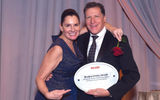 Whitney Ramirez of Trafalgar and Brendan Vacations with Travel Weekly’s Arnie Weissmann.