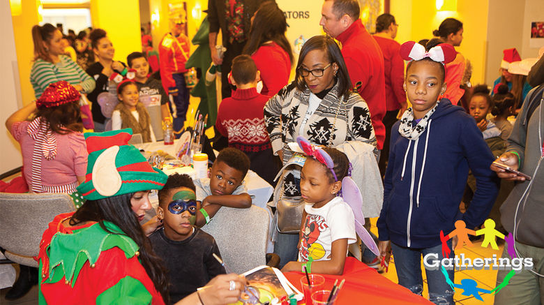 Volunteer Angelica Rivera, left, donned an elf's outfit and a paintbrush during Protravel International's annual Children's Holiday Party at New York's Mount Sinai Downtown hospital. The party, held in conjunction with the Children’s Brain Tumor Foundation, invited young patients, their families and caregivers to enjoy activities such as a magic show, a bounce house, live music and a visit from Santa. Each of the 400 kids who attended also received a gift.