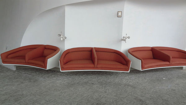 Custom-designed Charles Eames furniture in the former first-class lounge of the TWA Flight Center.