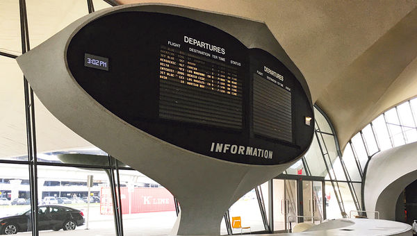 The Flight Center’s departures and arrivals information board.