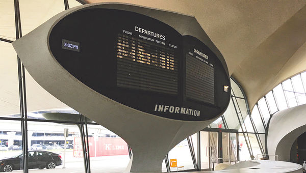 The Flight Center’s departures and arrivals information board.