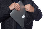 With 29 pockets, the OTG Jacket (for ''off the grid,'' according to Scottevest) approximates a wearable carryon, which can be a roomy boon to travelers miffed at having to pay extra for bringing a small bag on a plane. Attributes include front panels capacious enough to store a full-size laptop or books and magazines without showing a bulge, an RFID-blocking pocket and a pocket for a tablet. The quilted OTG, like the Tropiformer is machine washable, water/stain resistant, and covered by Scottevest's $1,000 anti-pickpocket guarantee.