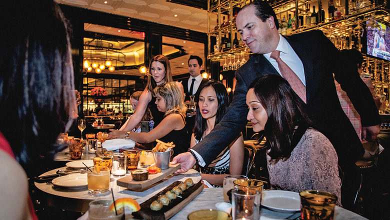 Guests sample bites at Bardot Brasserie during a Lip Smacking Foodie tour.