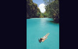 Snorkeling in the waters off the town of El Nido.