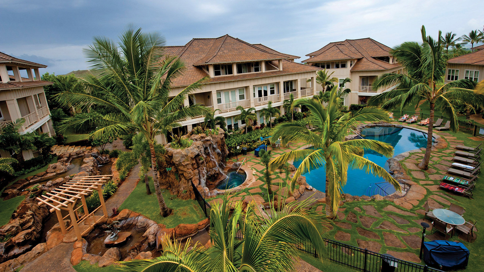 The Villas at Poipu Kai offer surfing lessons with the booking of a poolside villa.