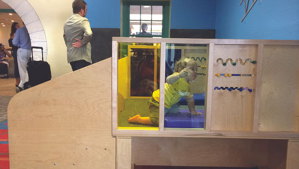 Play spaces at airports, such as the one at Bermuda’s L.F. Wade, can keep a toddler entertained while waiting.