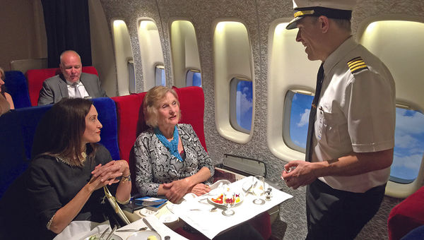 Anthony Toth, co-creator of the Pan Am Experience, talks with passengers Courtenay Taylor, left, and Maureen Taylor, a former Pan Am stewardess, in first class. Anthony Toth, co-creator of the Pan Am Experience, talks with passengers Courtenay Taylor, left, and Maureen Taylor, a former Pan Am stewardess, in first class.