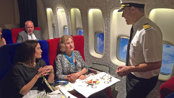 Anthony Toth, co-creator of the Pan Am Experience, talks with passengers Courtenay Taylor, left, and Maureen Taylor, a former Pan Am stewardess, in first class. Anthony Toth, co-creator of the Pan Am Experience, talks with passengers Courtenay Taylor, left, and Maureen Taylor, a former Pan Am stewardess, in first class.