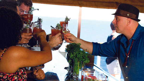 Mixologist Matthew Biancaniello, who is featured in the Carnival-produced cable show "Good Spirits," proposes a toast. Mixologist Matthew Biancaniello, who is featured in the Carnival-produced cable show "Good Spirits," proposes a toast.