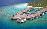Overwater bungalows, each with a private pool, are especially popular with American and Chinese guests who stay at the Outrigger Konotta Maldives Resort. At the tip of the pier is the 6,458-square-foot, three-bedroom Grand Konotta Villa.