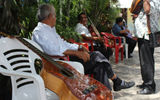 Buskers on break at Mercado 28.