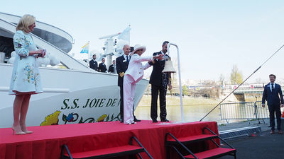 Actress Joan Collins, godmother of the S.S. Joie de Vivre, christening the ship on Monday. At left is Uniworld CEO Ellen Bettridge.