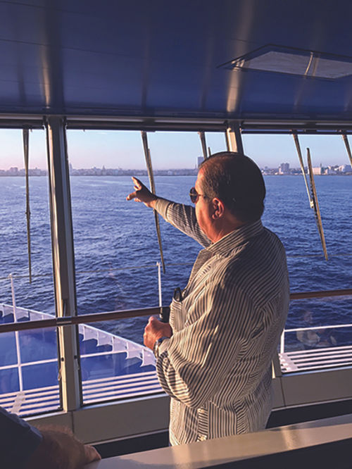 Frank Del Rio, the Cuba-born founder of Oceania and CEO of parent company Norwegian Cruise Line Holdings Ltd., on the Marina's bridge.