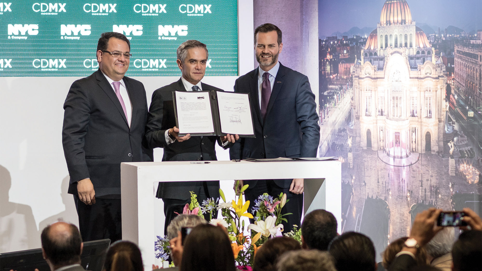From left, Mexico City minister of tourism Armando Lopez Cardenas, Mexico City mayor Miguel Angel Mancera and NYC & Company CEO Fred Dixon renewing their tourism partnership.