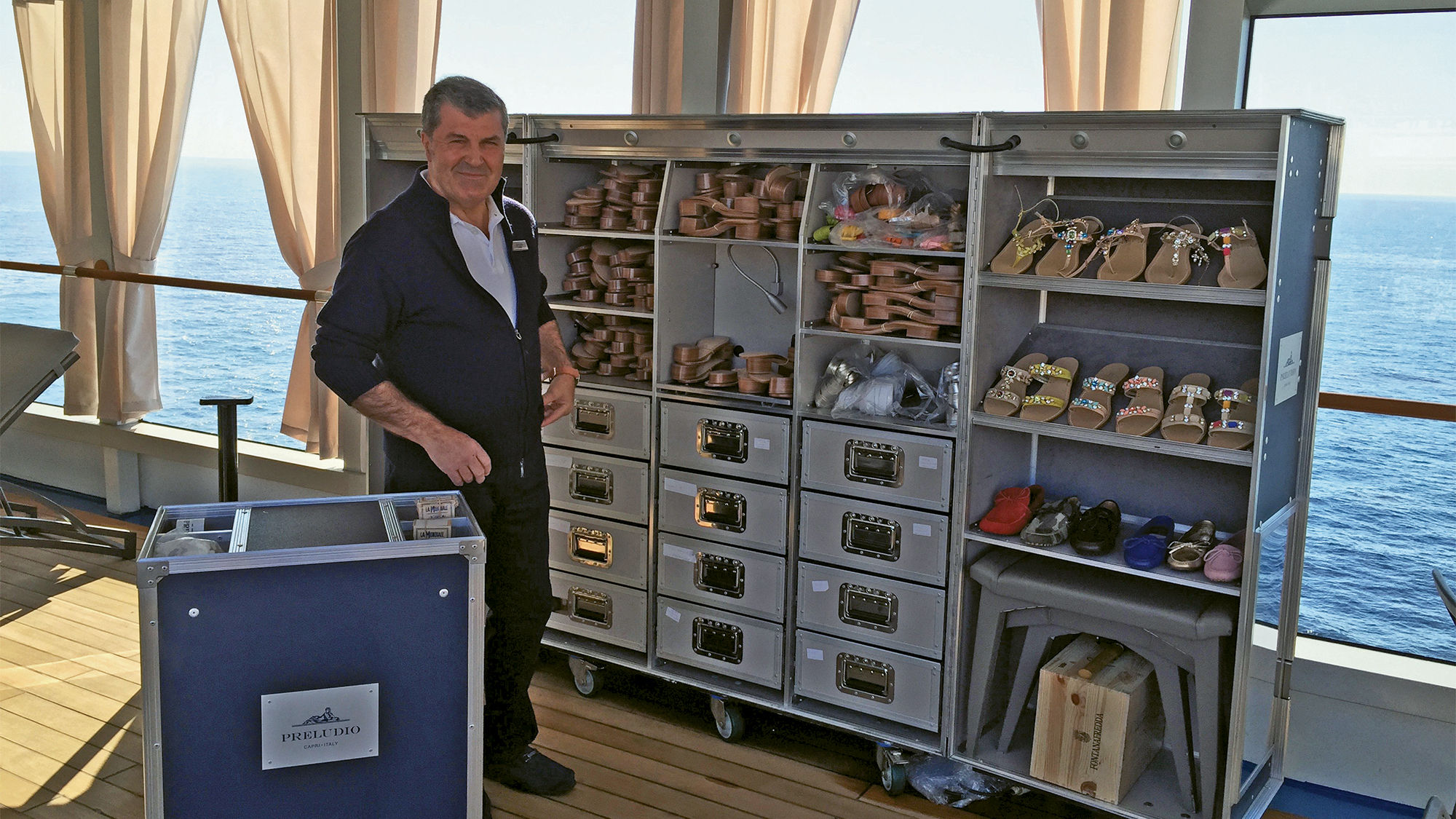 A cobbler from Capri, Italy, offers custom-made sandals at Preludio, a shop on the pool deck.