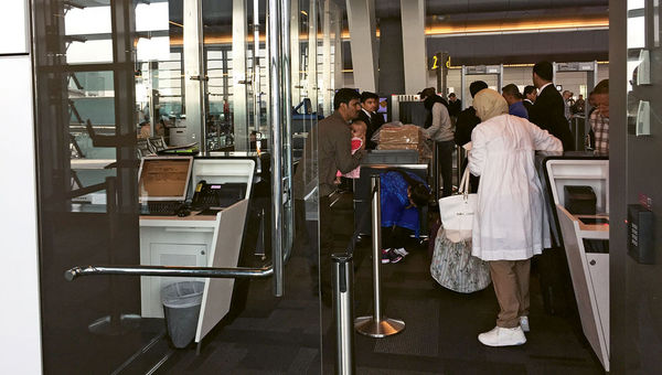 The security checkpoint at boarding gate of Doha Airport.