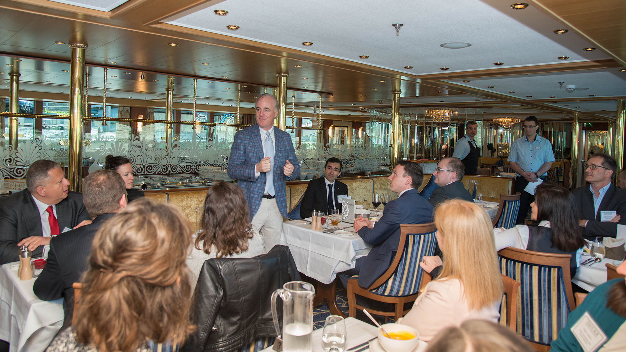 Tauck CEO Dan Mahar speaks to guests and crew at a reception celebrating the Sapphire's relaunch.
