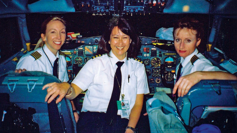 From left, Erika Armstrong captains a Northwest 727 jet in 2003 with flight engineer Laura Kivette and first officer Heidi Cala.