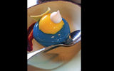 The blueberry cheesecake mousse wth passionfruit topping at Satu'li Canteen is inspired by the face of the Na'vi: blue with white speckles and bright yellow eyes.