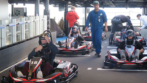 Competitors in the pit area prepare for a race. Guests in the Haven and Concierge premium accommodations will get complimentary use of the track. Competitors in the pit area prepare for a race. Guests in the Haven and Concierge premium accommodations will get complimentary use of the track.