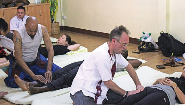 Students at the Wat Po Thai Traditional Massage School in Bangkok.