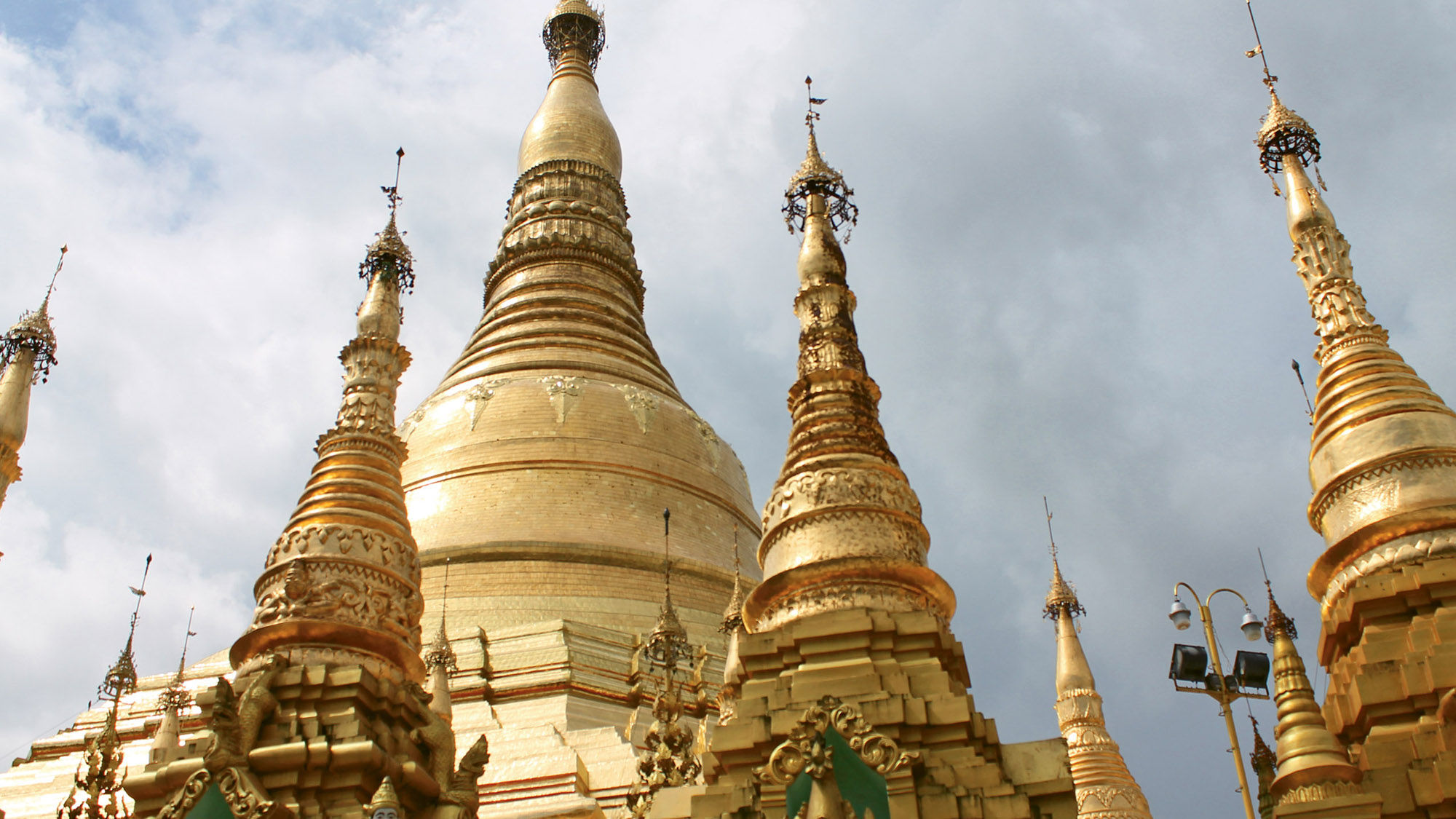 The Shwedagon Pagoda in Yangon is popular for photos at sunset but is less crowded in the late morning or early afternoon.