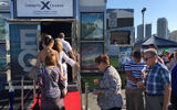 Travel agents, past guests and other VIPs queue up to enter the Leading Edge Mobile Theater on May 8 in Miami. The theater is on a 48-stop tour that will conclude June 20. Patrons were served truffled popcorn and a sparkling beverage, either cider or prosecco, depending on the time of day.