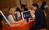 Marco Franco of Visitflanders meets with Jill Smith of Moonlight Travel during a 6-minute, one-on-one appointment.