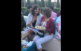 Patty Donovon, director of sales for the Chateau at Lake La Quinta in La Quinta, Calif., chats with Heather Dudick, senior account executive for passenger sales for Alaska Railroad, at the welcome reception.