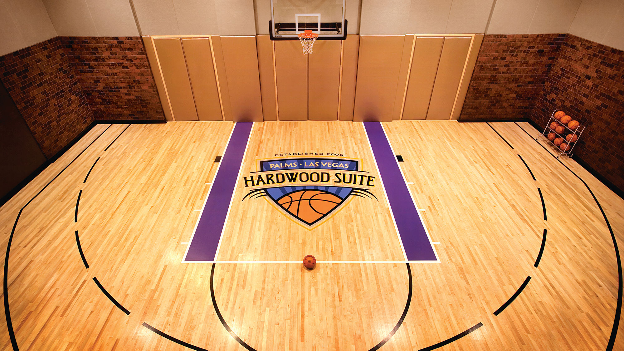 The Palms' Hardwood Suite, which includes a private indoor basketball court, is part of the Luxe Collection, on sale for 50% off this summer.