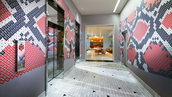 Playing card wallpaper in the elevator lobby at the W Las Vegas, another of the hotel's unique design touches.
