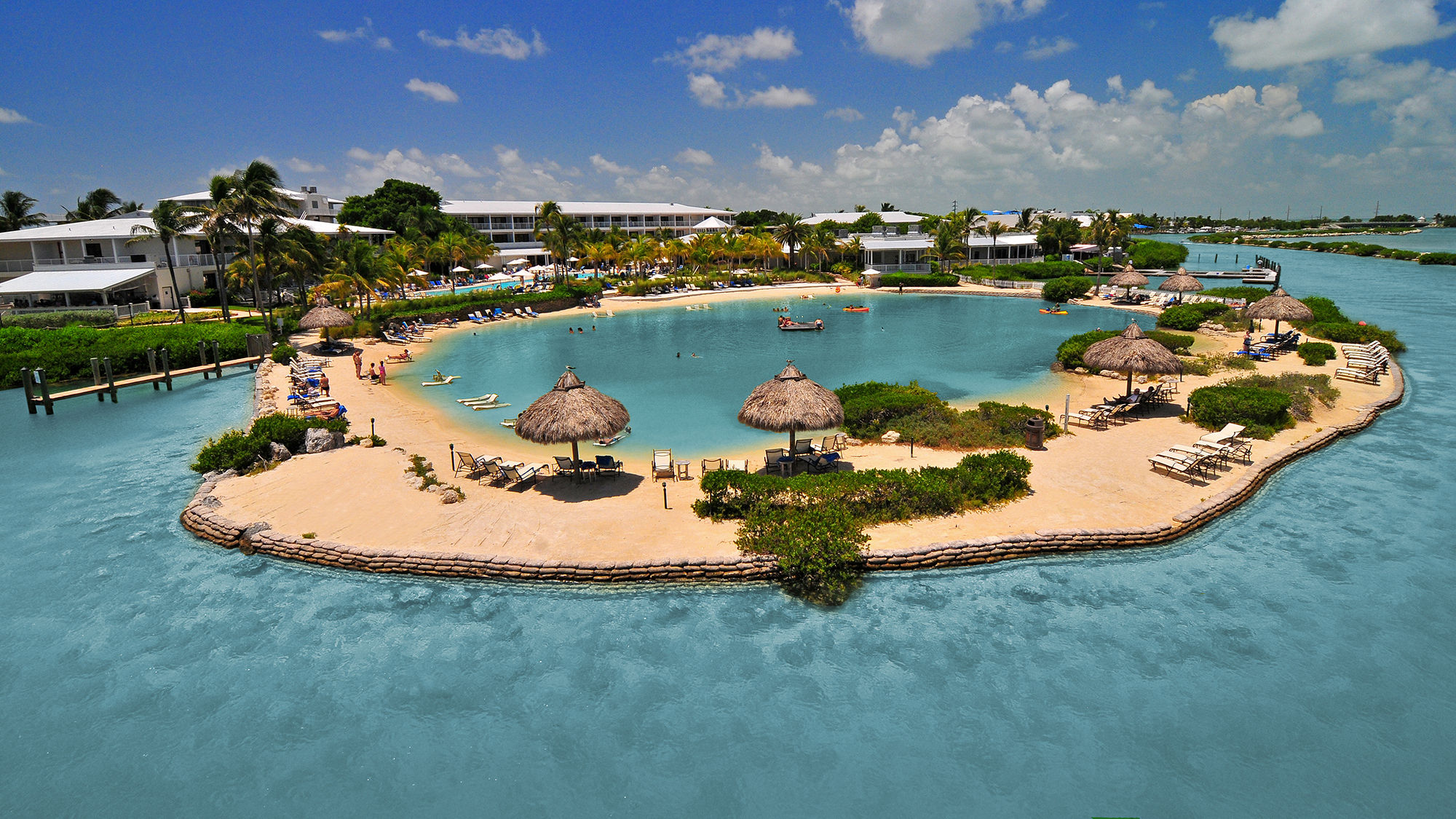 The saltwater lagoon at Hawks Cay Resort hosts mermaid encounters and paddleboard yoga, among other experiences.