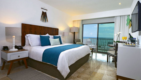 A Deluxe Room with a king bed. All of the redone rooms face the ocean and include a terrace and smart TVs. A Deluxe Room with a king bed. All of the redone rooms face the ocean and include a terrace and smart TVs.