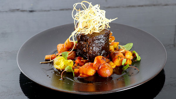 Black Sheep's American-Vietnamese menu includes dishes like slow-cooked short ribs with yucca gnocchi.