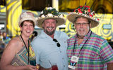 Rachelle Debaun of Peace Frogs Travel/Outfitters, Mark Bennigan of Dreamers Travel and Richard Stiff of Cruise Planners enjoy a Kentucky Derby-themed Welcome Reception sponsored by the Greater Fort Lauderdale Convention and Visitors Bureau.