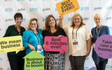 GTM attendees have some social media fun at the Step & Repeat sponsored by ShoreTrips.