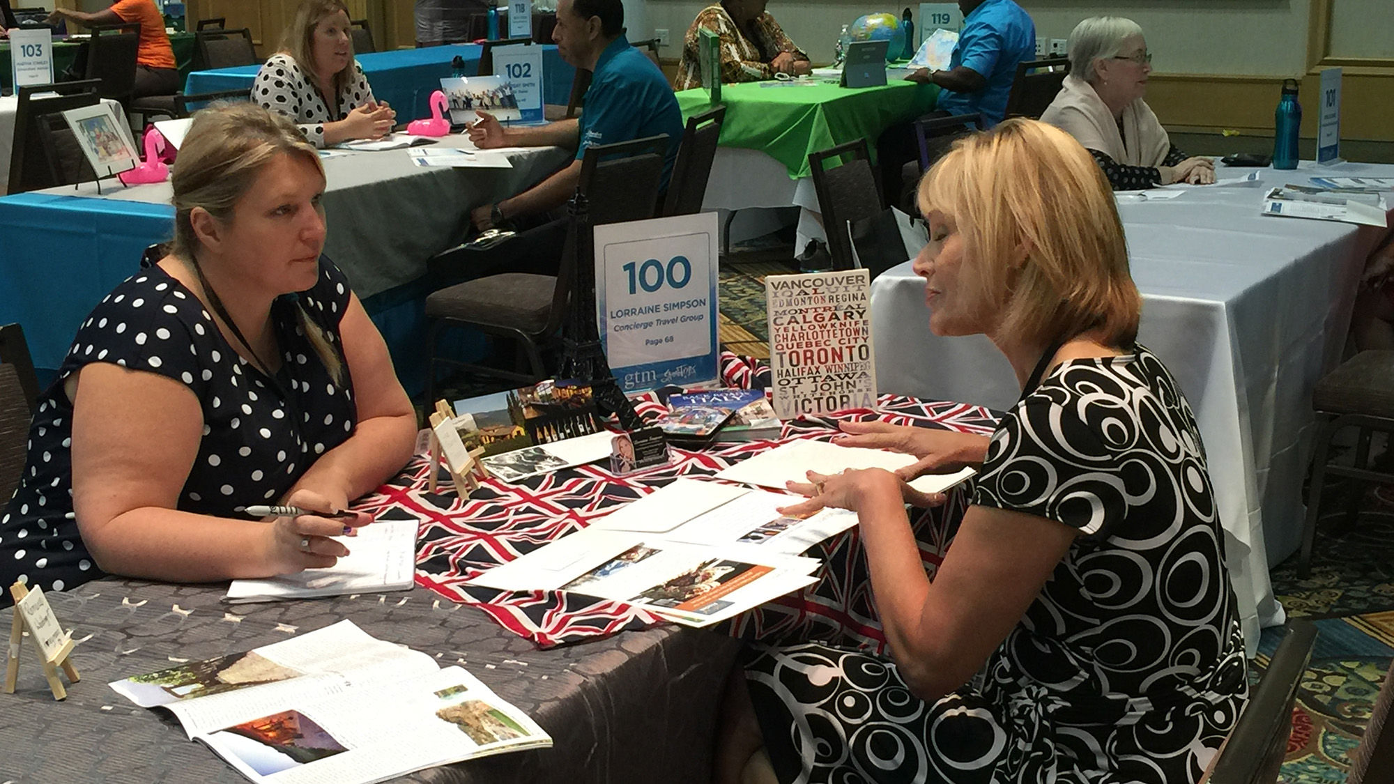 Lorraine Simpson (left) of Concierge Travel Group in Ontario, Canada, meets with Teresa Costa of Access Trips Culinary Tours at GTM.
